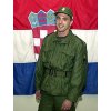 This year's Wimbledon winner Goran Ivanisevic, dressed in Croatian army uniform, stands before the national flag on the first day of his compulsory military service in a barracks near his home city of Split, November 28, 2001. Ivanisevic will be in a sports squad and will be allowed to practice and compete in tournaments during his six-month service. (Vladimir Dugandzic/Reuters) 
