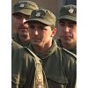 Wimbledon champion Goran Ivanisevic (C), dressed in a Croatian military uniform, stands in a parade during a swearing-in ceremony in Zagreb December 15, 2001. Ivanisevic will serve a six-month compulsory stint in a sports squad but will be able to train and play tournaments.