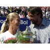 Wimbledon champion Goran Ivanisevic, pictured presenting Sweden's Asa Svensson with her Croatian Open trophy on May 5, is already planning his comeback after long-awaited surgery on his left shoulder. REUTERS/Nikola Solic