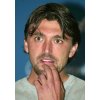 Defending Wimbledon men's singles champion Goran Ivanisevic, of Croatia, gestures during a news conference about his withdrawal from the 2002 Wimbledon tournament and his upcoming surgery, Tuesday, May 14, 2002, in Monaco. (AP Photo/Lionel Cironneau) 
