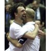 Croatians Goran Ivanisevic (L) and Ivan Ljubicic(R) celebrate their doubles victory over the American pair James Blake and Mardy Fish in a Davis Cup tie in Zagreb, February 8, 2003. Croatia defeated the USA 3-6, 4-6, 7-6 (7-4), 6-4, 6-4. (Nikola Solic/Reuters) 