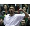 Croatia's Goran Ivanisevic celebrates after winning a Davis Cup doubles with Ivan Ljubicic against Americans James Blake and Mardy Fish in Zagreb February 8, 2003. Croatia defeated the USA 3-6 4-6 7-6 (7-4) 6-4 6-4. REUTERS/Nikola Solic 
