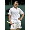 Croatia's Goran Ivanisevic reacts during his first round match against Russia's Mikhail Youzhny at the Wimbledon Tennis Championships in London, June 21, 2004. REUTERS/Kevin Lamarque 