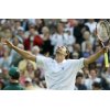 Former champion Goran Ivanisevic reacts after defeating Russia's Mikhail Youzhny in their Men's Singles, first round match on the Centre Court at Wimbledon, Monday June 21, 2004. (AP Photo/Dave Caulkin) 