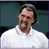 Goran Ivanisevic beats first round nerves and shows his delight at returning to Wimbledon.