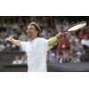 Goran Ivanisevic of Croatia celebrates his victory over 31st seed Mikhail Youzhny of Russia in their first round match at the Wimbledon Tennis Championships in London June 21, 2004. Ivanisevic won 6-3 7-6 6-2. (Kevin Lamarque/Reuters)