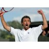  Croatia's Goran Ivanisevic celebrates breaking the serve of Italy's Filippo Volandri in their second round match at the Wimbledon Tennis Championships in London, June 24, 2004. Ivanisevic won the match 4-6 7-6 1-6 6-3 6-4. REUTERS/Gerry Penny
