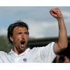  Croatia's Goran Ivanisevic celebrates breaking the serve of Italy's Filippo Volandri in their second round match at the Wimbledon Tennis Championships in London, June 24, 2004. Ivanisevic won the match 4-6 7-6 1-6 6-3 6-4. REUTERS/Gerry Penny 