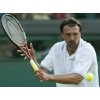  Goran Ivanisevic, plays a return to Australia's Lleyton Hewitt, during their Men's Singles, match on the Centre Court at Wimbledon, Friday June 25, 2004. (AP Photo/Anja Niedringhaus)