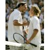  Croatia's Goran Ivanisevic (L) embraces seventh seed Australia's Lleyton Hewitt at the end of their third round match at the Wimbledon Tennis Championships in London, June 25, 2004. Hewitt won the match 6-2 6-3 6-4. REUTERS/Ian Hodgson 