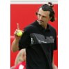 Goran Ivanisevic of Croatia reacts to the crowd during the Stella Artois challenge match against John McEnroe at Queen's Club in London, Sunday, June 12, 2005. (AP Photo/Sang Tan) 