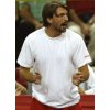 Former Croatian top tennis player Goran Ivanisevic supports Ivan Ljubicic during the Davis Cup third singles semi-final tennis match against Russia\'s Nikolay Davydenko at the Croatian Adriatic port of Split September 25, 2005. Ljubicic pumelled Davydenko 6-3 7-6 6-4 on Sunday to send Croatia into the Davis Cup final for the first time. The 26-year-old sparked wild celebrations in the packed Gripe Sports Hall after completing a hat-trick of victories in the semi-final to give the hosts a winning 3-1 lead. REUTERS/Nikola Solic 