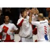 Croatia\'s Tennis Davis Cup team player Ivan Ljubicic, right, celebrates with teammates Goran Ivanisevic, left, and Ivan Karlovic, center, after winning 6-3, 6-4, 6-3 against Slovak veteran Karol Kucera in the Davis Cup finals in Bratislava, Slovak Republic, on Friday, Dec. 2, 2005. Slovakia and Croatia, both first-time finalists, will play their matches from Dec. 2 to 4, 2005. (AP Photo/Anja Niedringhaus)