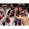 Croatia\'s Davis Cup team player Ivan Ljubicic, right, greets former Wimbledon champion Goran Ivanisevic as he jubilates after winning the match against Dominik Hrbaty and Michal Mertinak of Slovakia in the Davis Cup final doubles in Bratislava, Slovakia, Saturday, Dec. 3, 2005. Croats won 7-6, 6-3, 7-6. (AP Photo/Darko Bandic) 