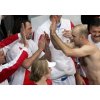 Croatia\'s Ivan Ljubicic (2nd R) celebrates with Goran Ivanisevic and team members after winning his doubles tennis match at the Davis Cup finals in the Slovak capital of Bratislava December 3, 2005. Ljubicic and team mate Mario Ancic defeated Mertinak and Hrbaty 7-6 6-3 7-6. REUTERS/Petr Josek 