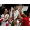 Croatia\'s Mario Ancic (R) celebrates with Goran Ivanisevic and team members after winning his doubles tennis match at the Davis Cup finals in the Slovak capital of Bratislava December 3, 2005. Ancic and team mate Ivan Ljubicic defeated Slovakia's Dominik Hrbaty and Michal Mertinak 7-6 6-3 7-6. REUTERS/Petr Josek