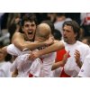 Croatia\'s Davis Cup team player Mario Ancic is embraced by team member Ivan Ljubicic fter defeating Slovakia\'s Michal Mertinak in the Davis Cup final in Bratislava, Slovakia, Sunday, Dec. 4, 2005. Team member Goran Ivanisevic celebrates on right. (AP Photo/Anja Niedringhaus) 