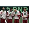 Croatia\'s Davis Cup team members Mario Ancic, left, Goran Ivanisevic, center left, Ivan Ljubicic, center right, and the team's captain Nikki Pilic, celebrate after defeating Slovakia in their Davis Cup final match in Bratislava, Slovakia, Sunday, Dec. 4, 2005. (AP Photo/Darko Bandic) 