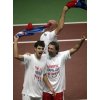 Croatia\'s Davis Cup team members Mario Ancic, left, Goran Ivanisevic, right and Ivan Ljubicic, top celebrate after defeating Slovakia in their Davis Cup final match in Bratislava, Slovakia, Sunday, Dec. 4, 2005. (AP Photo/Darko Bandic) 