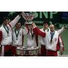 Croatia\'s Davis Cup team members Ivo Karlovic, left, Goran Ivanisevic, center left, captain Nikki Pilic, center Mario Ancic, center right and Ivan Ljubicic, right, jubilate after defeating Slovakia\'s team in their Davis Cup final match in Bratislava, Slovakia, Sunday, Dec. 4, 2005. (AP Photo/Darko Bandic) 