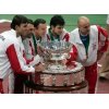 Team Croatia Ivo Karlovic, Goran Ivanisevic, captain Nikola Pilic, Mario Ancic and Ivan Ljubicic (L-R) pose for photographers behind the Davis Cup trophy at the end of the finals in the Slovak capital of Bratislava December 4, 2005. Mario Ancic of Croatia defeated Slovakia\'s Michal Mertinak in three sets 7-6 6-3 6-4 to give Croatia a 3-2 victory. REUTERS/Petr Josek