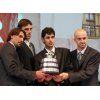 Croatian Davis Cup winning team, from left, Goran Ivanisevic, Ivo Karlovic, Mario Ancic and Ivan Ljubicic, hold a replica Davis Cup trophy in front of tens of thousands fans gathered at the welcome ceremony in Zagreb, Croatia, Monday, Dec. 5, 2005. Croatia\'s tennis team returned to a rapturous welcome Monday after winning the Davis Cup, one of nation's biggest sports achivements since gaining independence 13 years ago. (AP Photo/Filip Horvat) 