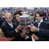 Davis Cup winners Goran Ivanisevic, Mario Ancic and Ivan Ljubicic (R-L) hold the trophy upon their arrival in Zagreb December 5, 2005. Thousands of Croats braved drizzle on Monday to meet on the capital\'s main square and give an ecstatic welcome to their Davis Cup champions. Croatia beat Slovakia 3-2 in Bratislava at the weekend to win the Davis Cup for the first time. They are only the 12th nation to win the title in more than 100 years of the competition\'s history. REUTERS/ Davor Kovacevic 